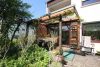Einfamilienhaus in Grenzbauweise mit schönem Naturgartenambiente, Terrasse, Balkon und Garage - 21018-JI-15