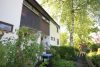 Einfamilienhaus in Grenzbauweise mit schönem Naturgartenambiente, Terrasse, Balkon und Garage - 21018-JI-9