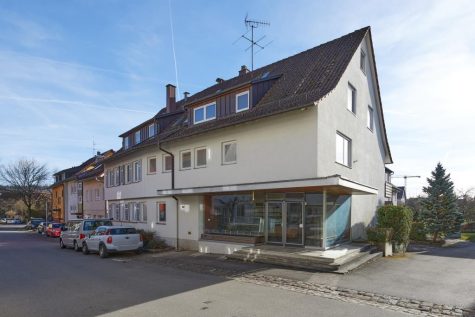 Charmantes Mehrfamilienhaus mit Ladeneinheit, Außenstellplätzen, Balkonen und Sanierungsbedarf, 72074 Tübingen, Mehrfamilienhaus