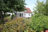 Wohnhaus mit Wintergarten, Natursteinambiente, Garage u. attraktiver Pflanzen- u. Gartenstruktur! - 22054-JI-7